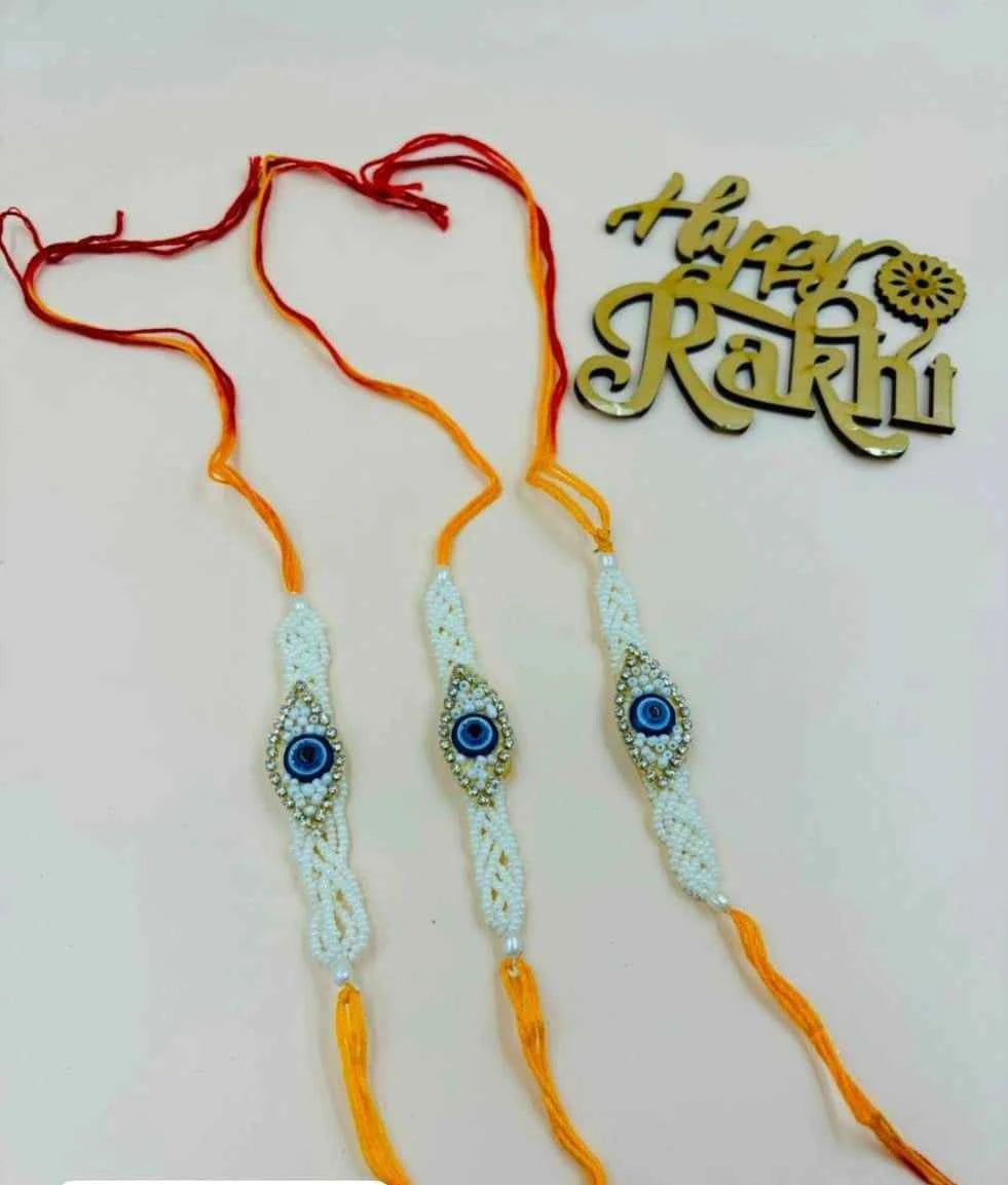 Premium Evil Eye Rakhi with White Pearls – Stylish Raksha Bandhan Rakhi