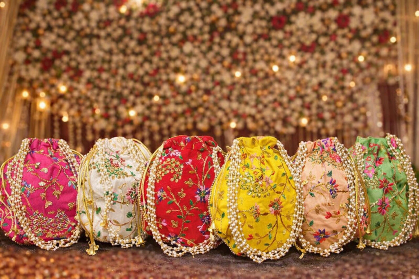 Designer bridal potli bag with traditional embroidery work