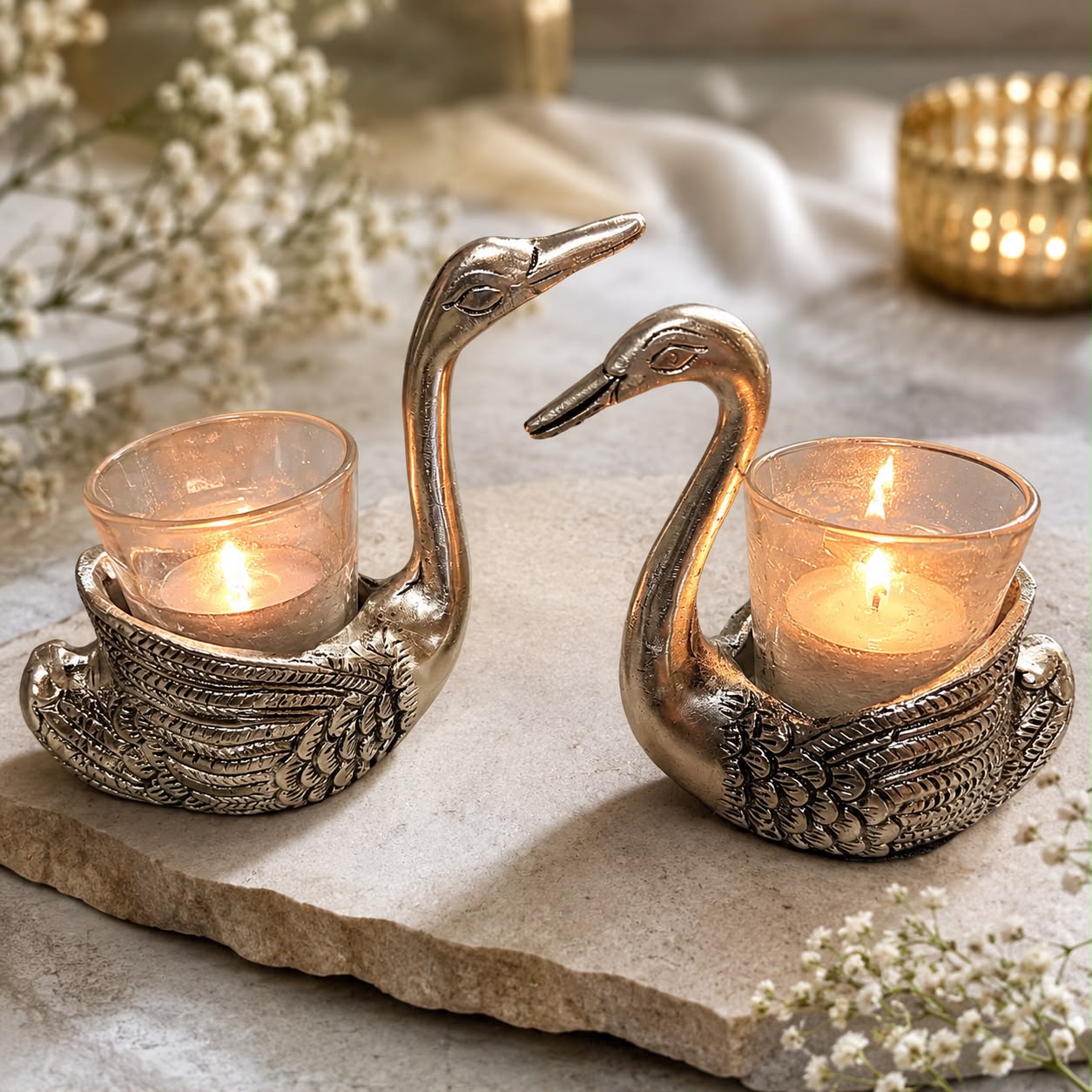 Elegant German Silver Swan Tealight Candle Holder Set with premium silver finish for luxury home decoration, living room decor, table centerpiece, wedding gift, housewarming gift and festive decoration.