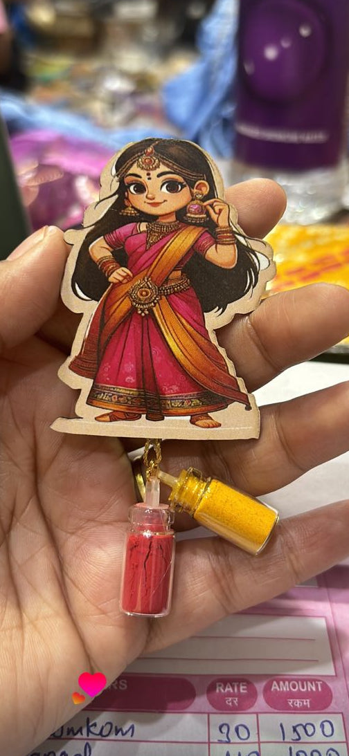 Maharashtrian style woman cutout used for haldi kumkum ceremony decoration