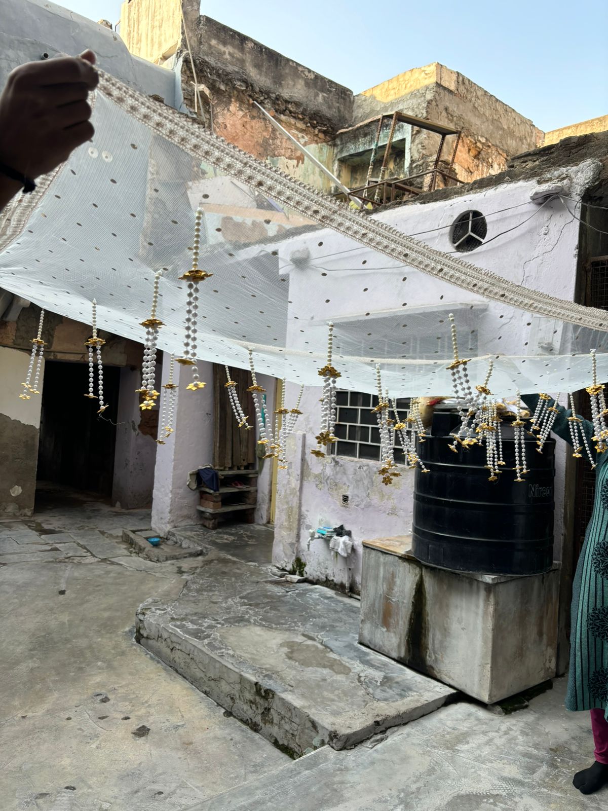 Pearl hanging bridal entry chadar with golden floral drops used for Indian wedding bridal entry