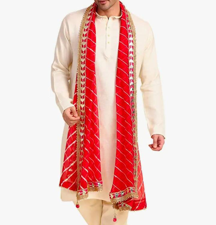 Wedding red chunari dupatta with golden lace border worn for Indian wedding rituals