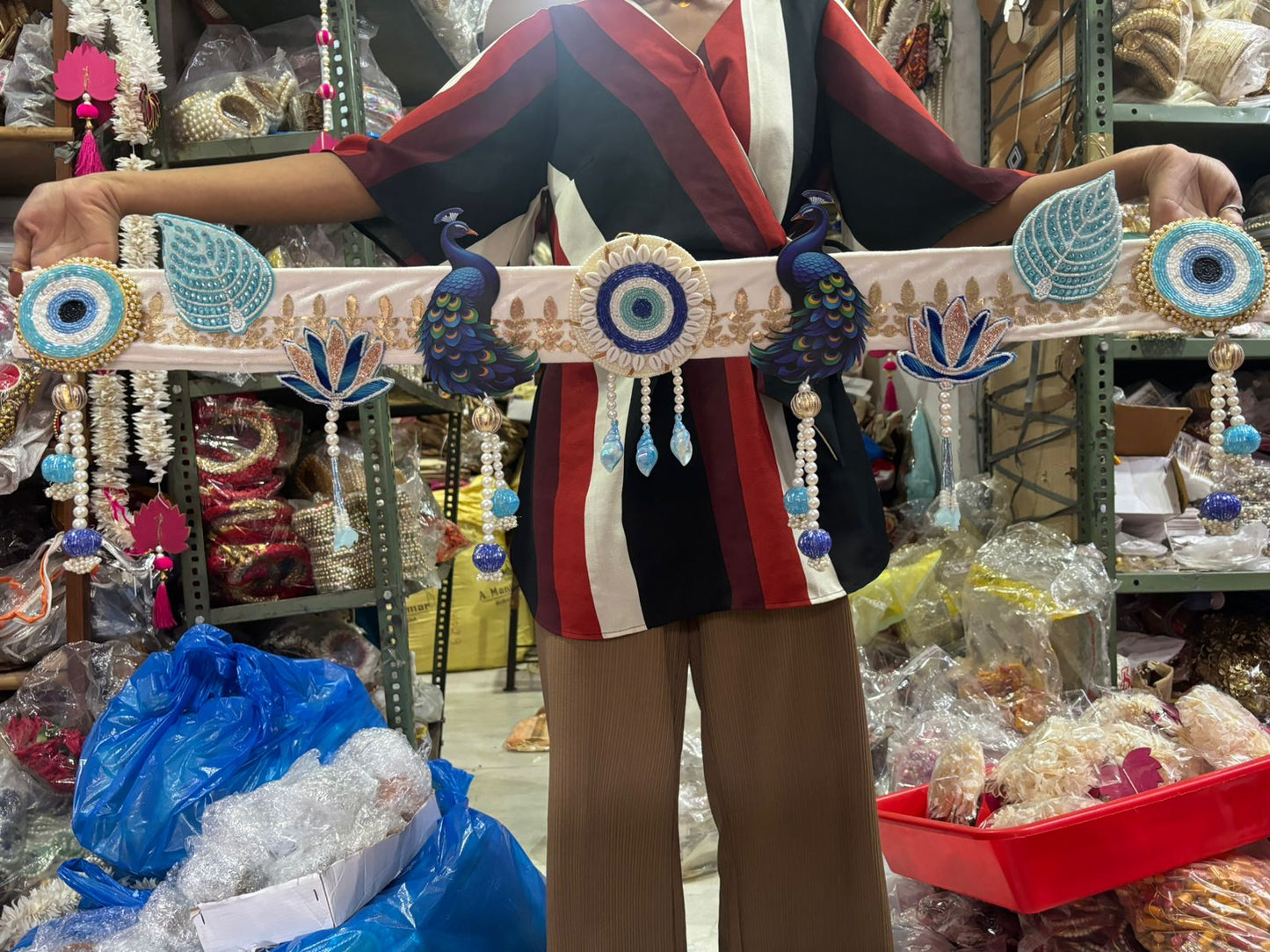 Evil eye peacock design bandarwal hanging on main door for auspicious home decor