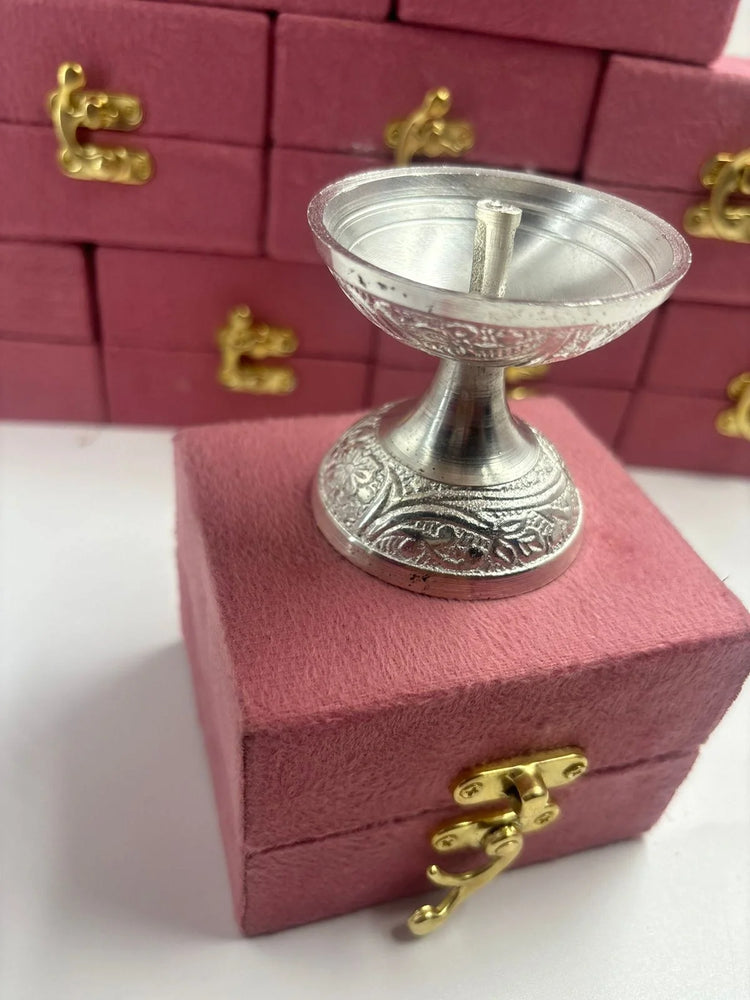 Premium Diwali hampers for clients with German silver diya in velvet box