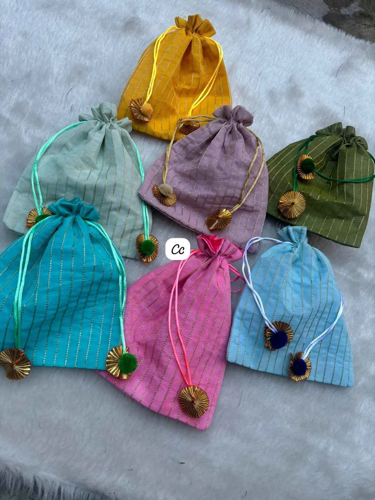 Decorative fabric potli pouch 8 by 10 inch size for wedding return gifts and traditional gifting