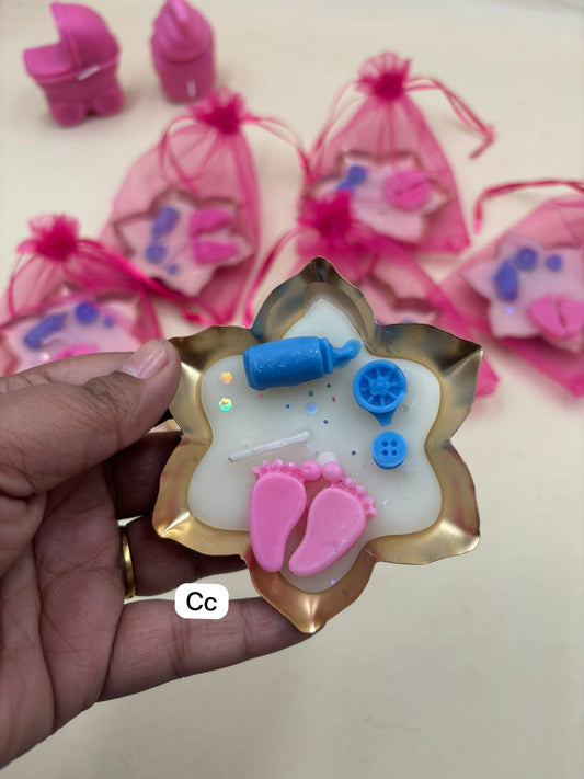 Baby shower candle gift packed in decorative potli bag for return gifting