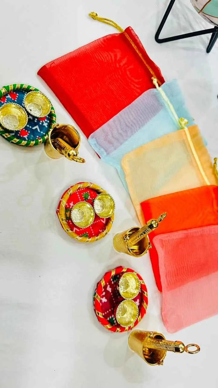 Holi Roli Chawal Thali with Balti Pichkari in Potli Packing