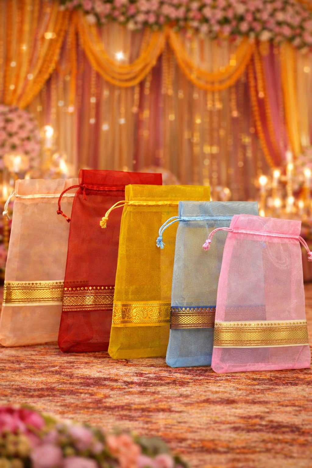Elegant Banarasi organza potli bag with traditional woven pattern and golden drawstring for weddings and festive gifting