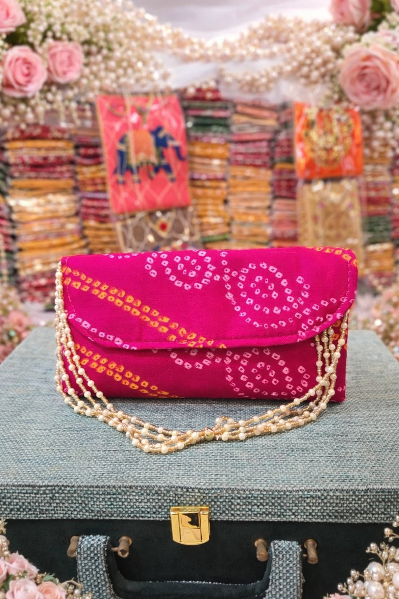 Handcrafted Bandhej clutch purse with traditional tie-dye pattern perfect for wedding functions and festive celebrations