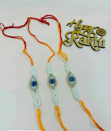 Premium Evil Eye Rakhi with White Pearls – Stylish Raksha Bandhan Rakhi