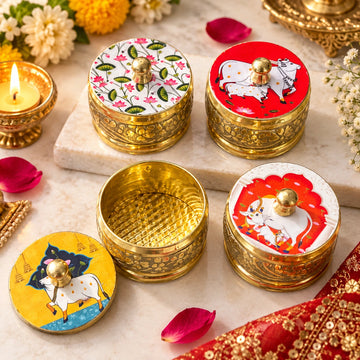 Brass sindoor box with colorful cow design for pooja, wedding and traditional gifting