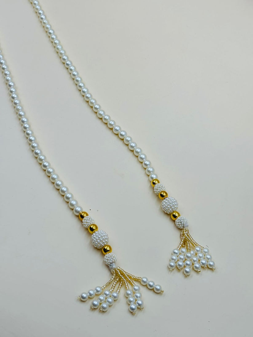 Classic pearl mala necklace with tassel drops for traditional and festive wear