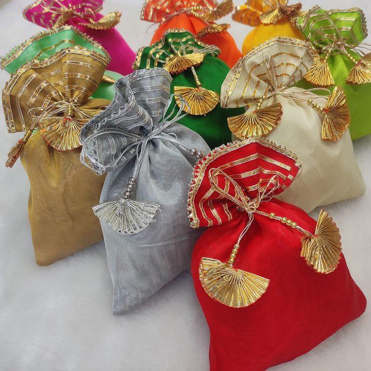 Traditional mini potli pouch for mehendi, haldi, and party favors, ideal for gifting dry fruits or small jewelry