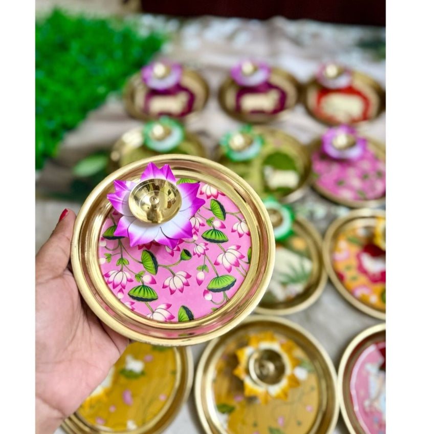 Decorative Pichwai style roli chawal plate with diya for Raksha Bandhan, wedding rituals and Hindu pooja