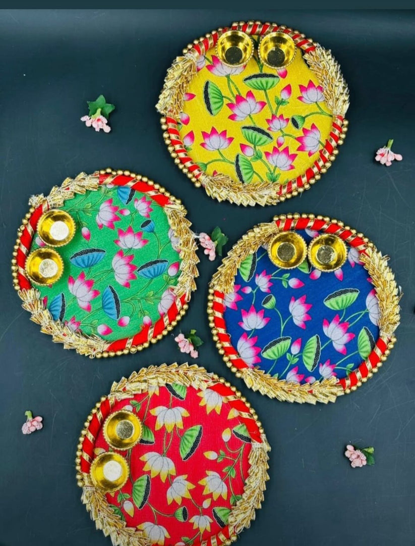 Decorative roli chawal plate with Pichwai artwork for festivals and religious ceremonies