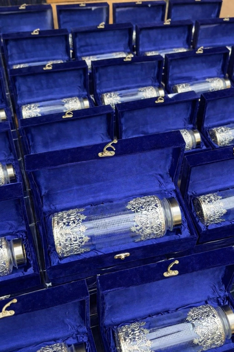Premium German silver bottle with glass close-up view