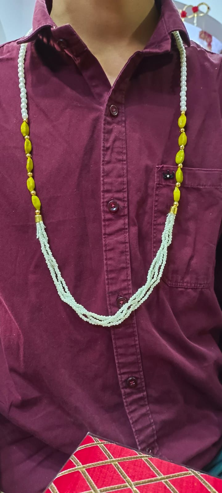 Traditional elaichi mala for Indian wedding swagat