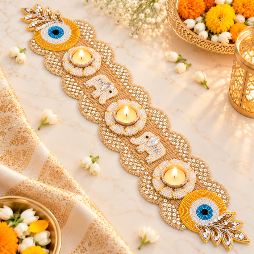 Designer elephant tea light runner featuring pearl work, golden embellishments and decorative elephant motifs for Diwali table decoration.