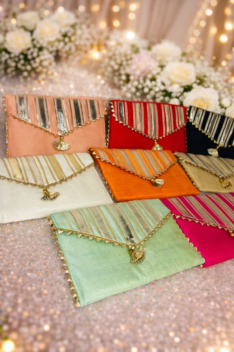Elegant designer hand purse for girls, stylish small handbag perfect for parties, weddings and festive occasions.