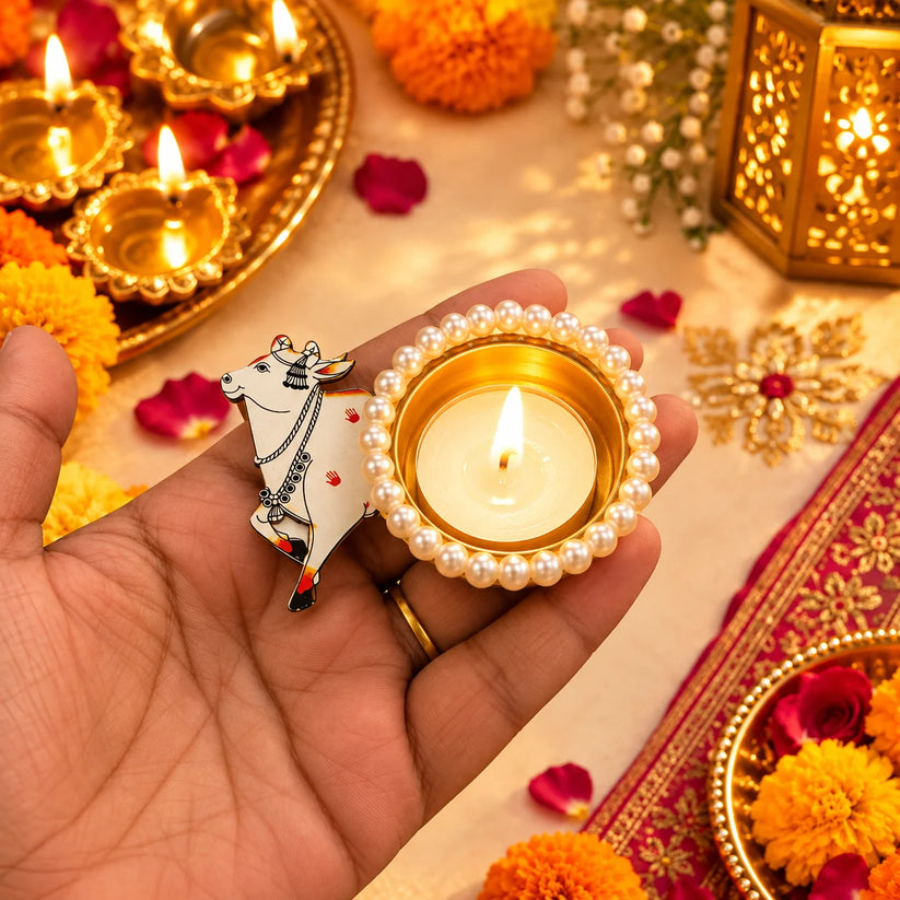 Designer Kamdhenu cow tealight holder with golden finish for Diwali pooja and festive home decoration