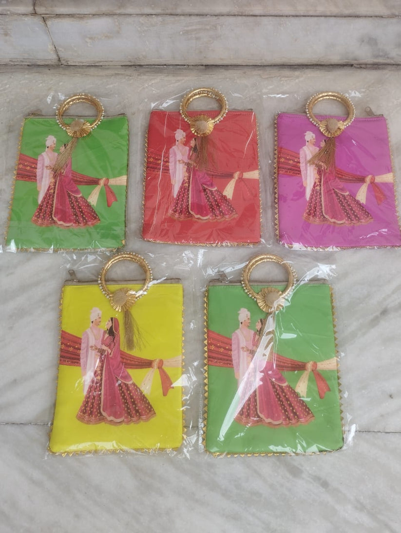Beautiful mini shagun potli bag with copel pattern ideal for wedding favors, festival gifts, and traditional ceremonies