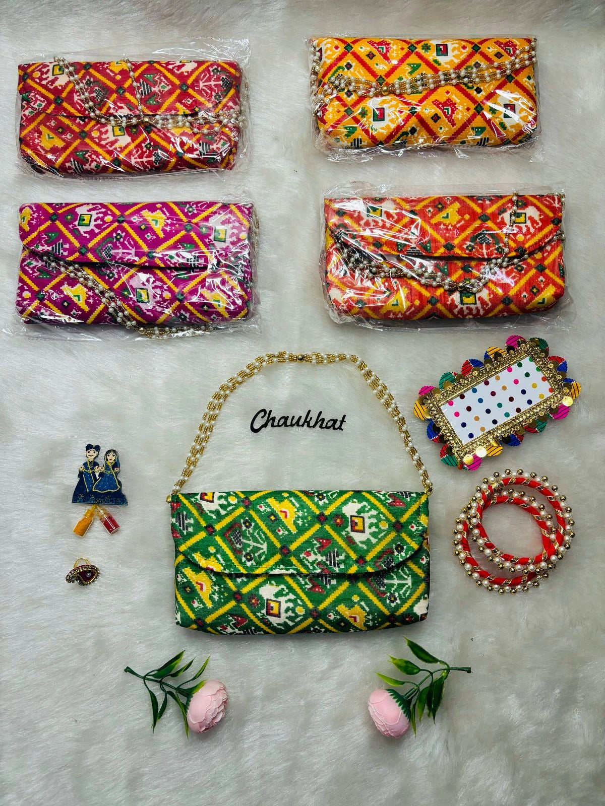 Designer Patola fabric clutch used for haldi kumkum, kangan and bindi ceremony in Indian wedding