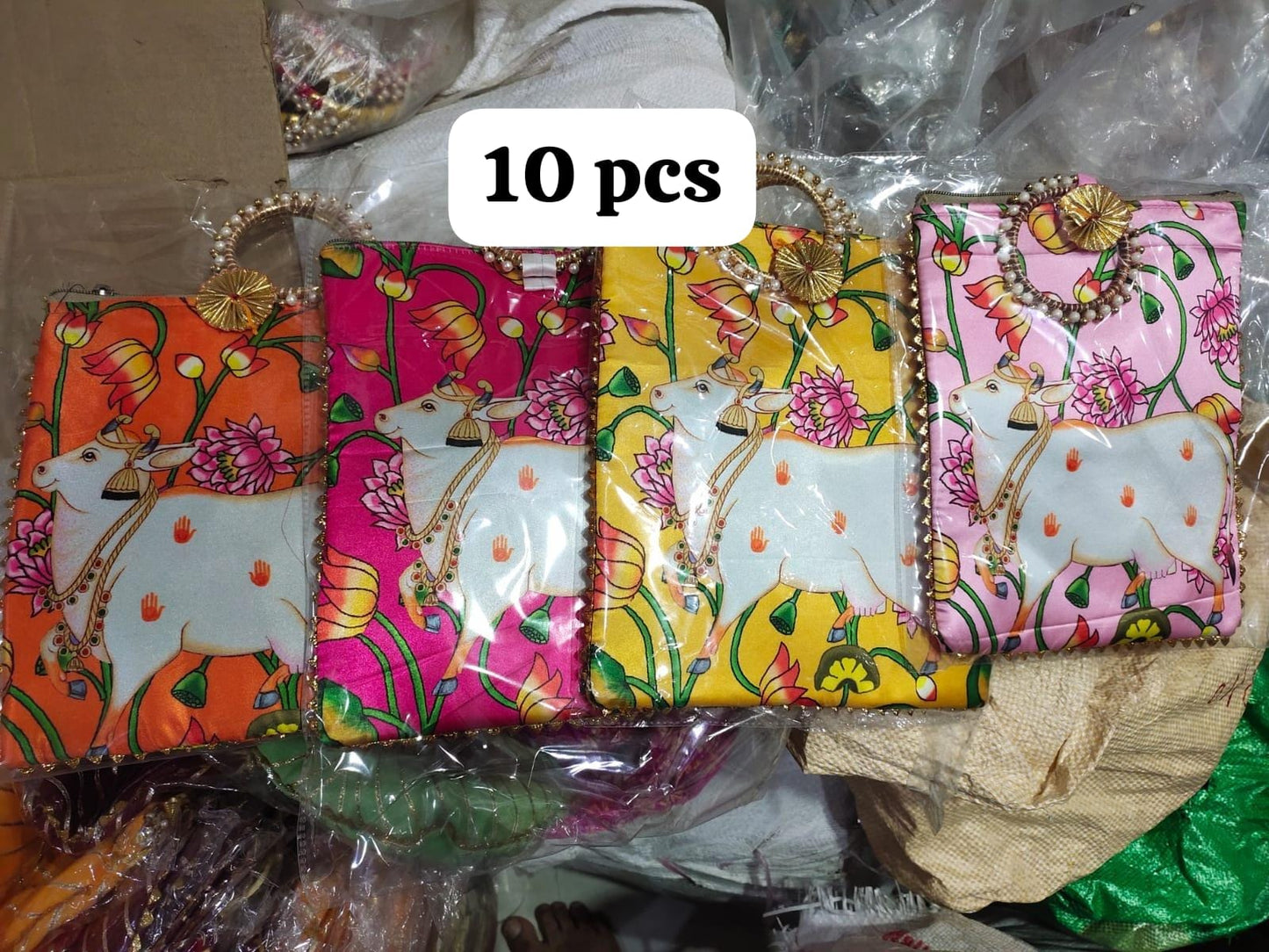 Designer Pichwai print potli bag for bridal trousseau