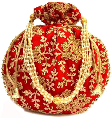 Designer potli bag for gifting with elegant traditional design for weddings and festivals