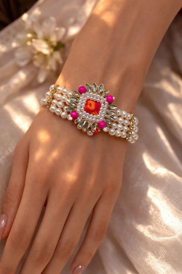 Close view of pearl kundan bridal hand bracelet designed for haldi mehndi event, perfect accessory for brides and bridesmaids