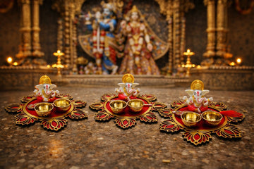 Decorative Ganesh roli chawal platter used for tilak ceremony and pooja rituals