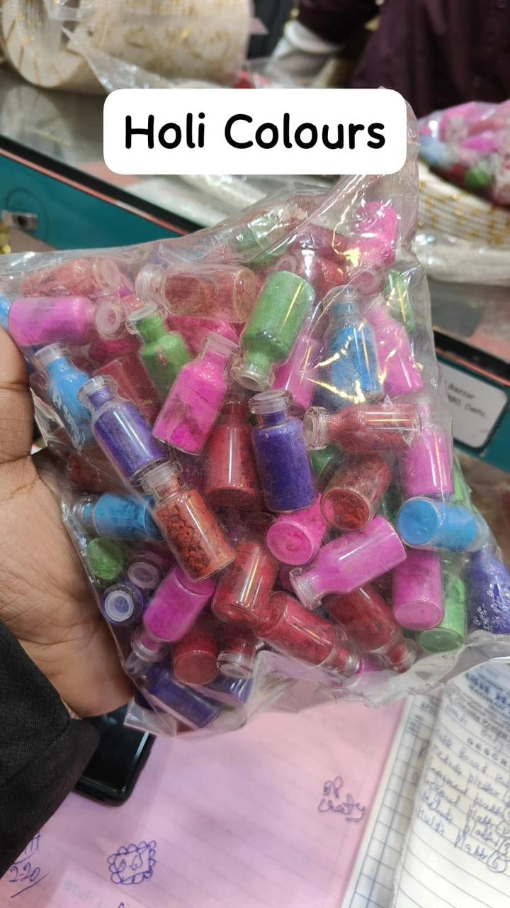 Glass gulal bottle used for Holi gifting, festive hampers and decoration