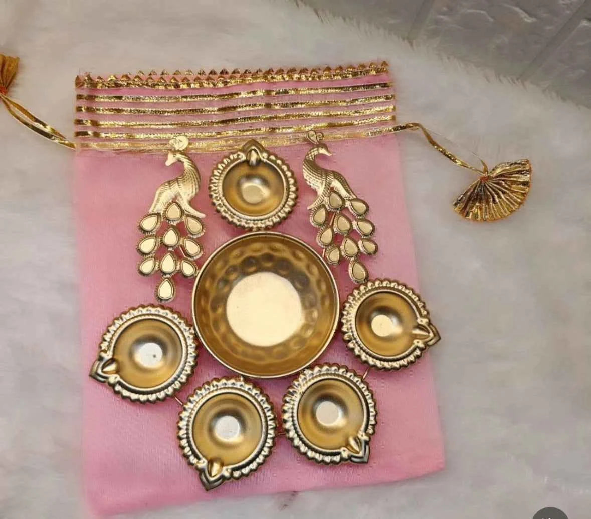 Decorative Brass Urli with Potli for Floating Flowers and Candles