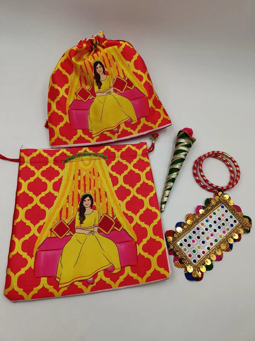 haldi mehndi return gift hamper with bindi mehndi cones and bangles for wedding guests