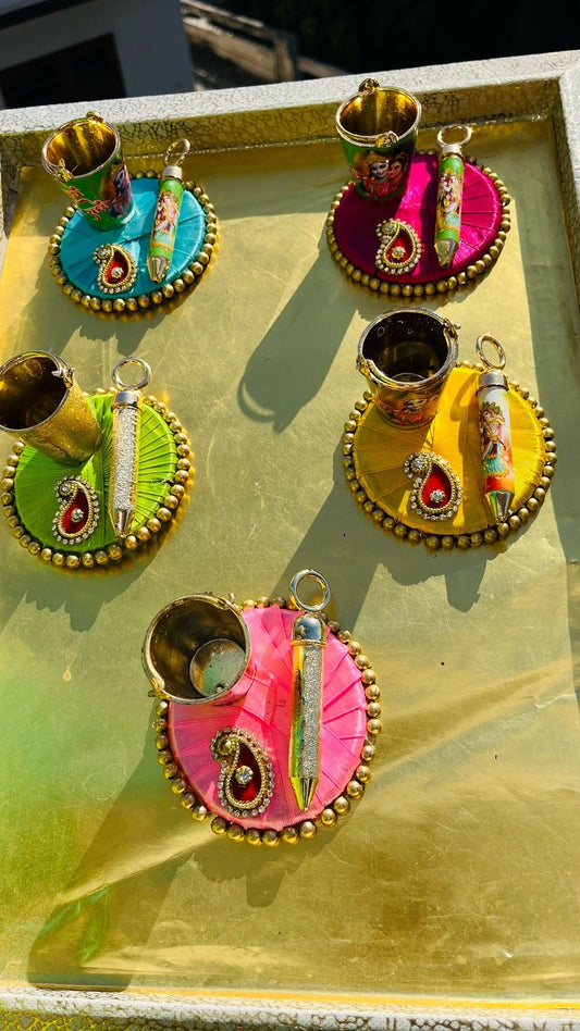 Kanha themed balti and pichkari platter for Holi gifting and decoration