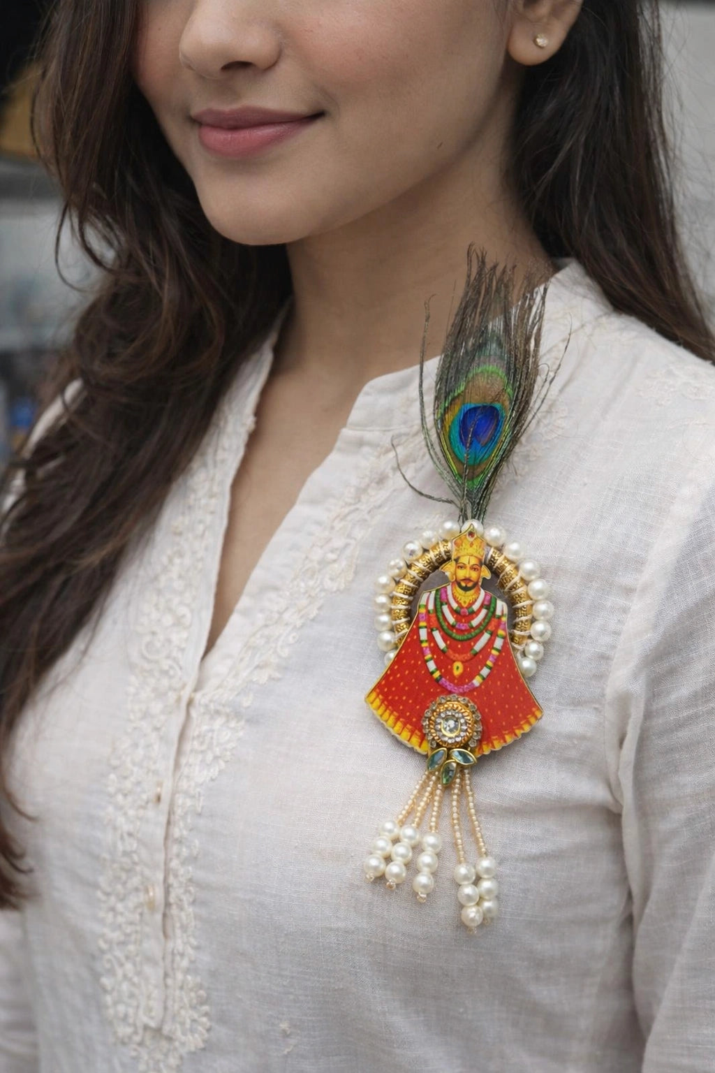 Khatu Shyam Ji devotional brooch with kundan and peacock feather design