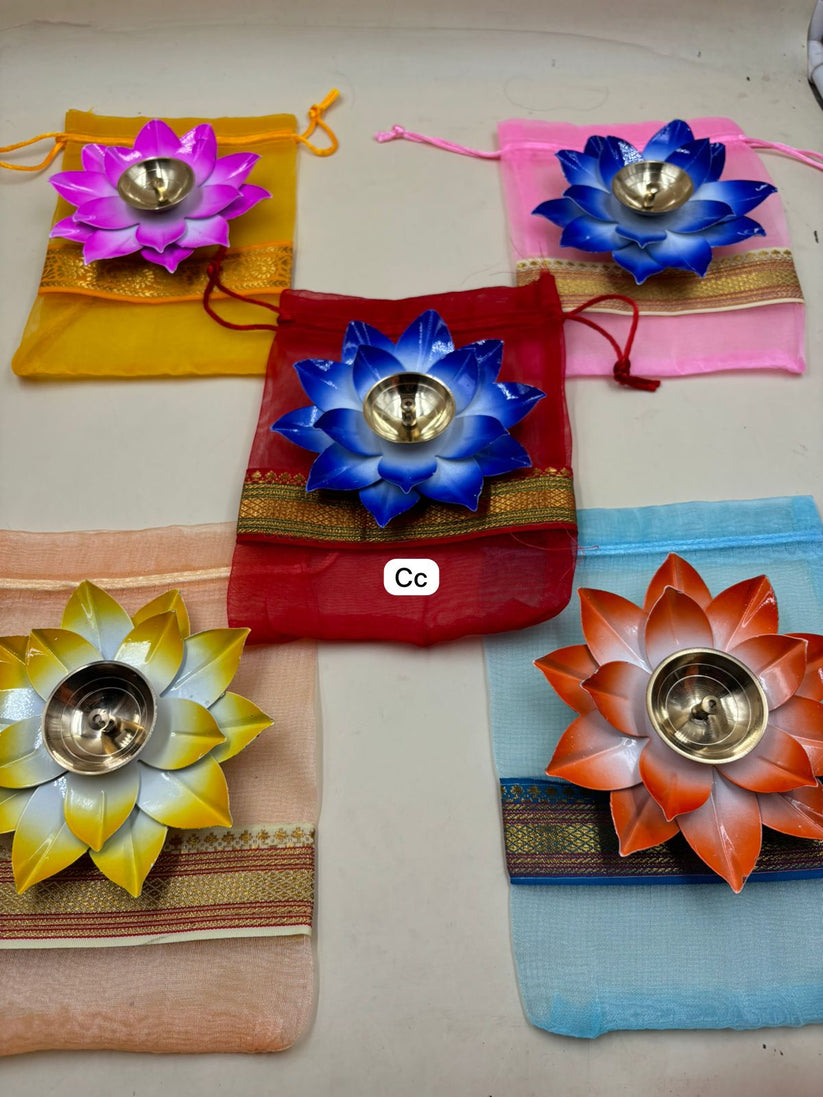 Lotus shaped diya packed in decorative potli bag for Diwali, wedding return gifts and pooja rituals