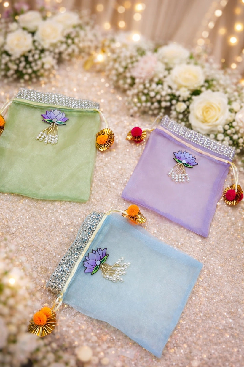 Lotus theme organza potli bag for wedding favors and festive gift packaging