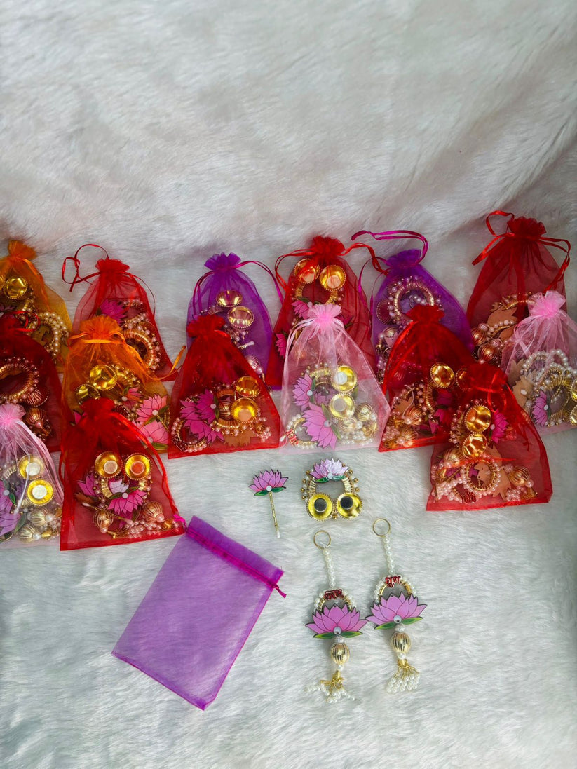 Mini potli bag gift set with shubh labh pair roli chawal plate and tilak stick for weddings and festivals