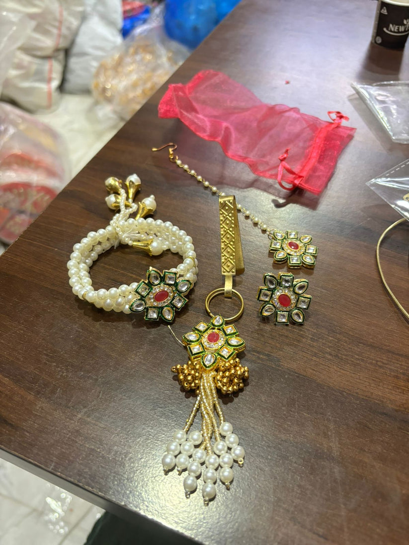 Mini potli gift set with pearl design bracelet tika satka and ring for weddings