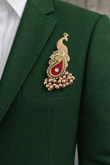 Elegant peacock brooch with kundan stones and detailed feather design