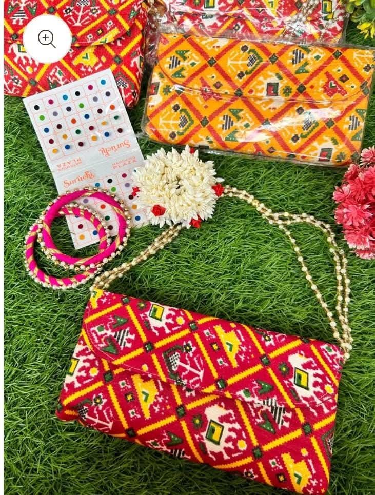 Pearl handle purse gift set with gajra, kangan and bindi for weddings and festive occasions