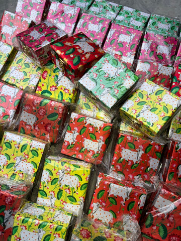 Traditional pichwai cow print gift box with Indian art design for pooja and festive packaging