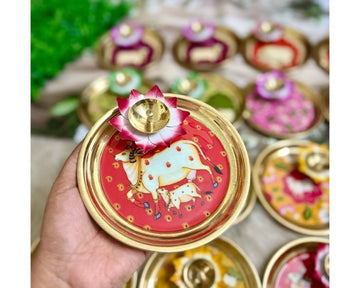 Pichwai cow print decorative plate with lotus diya for pooja and festive home decor