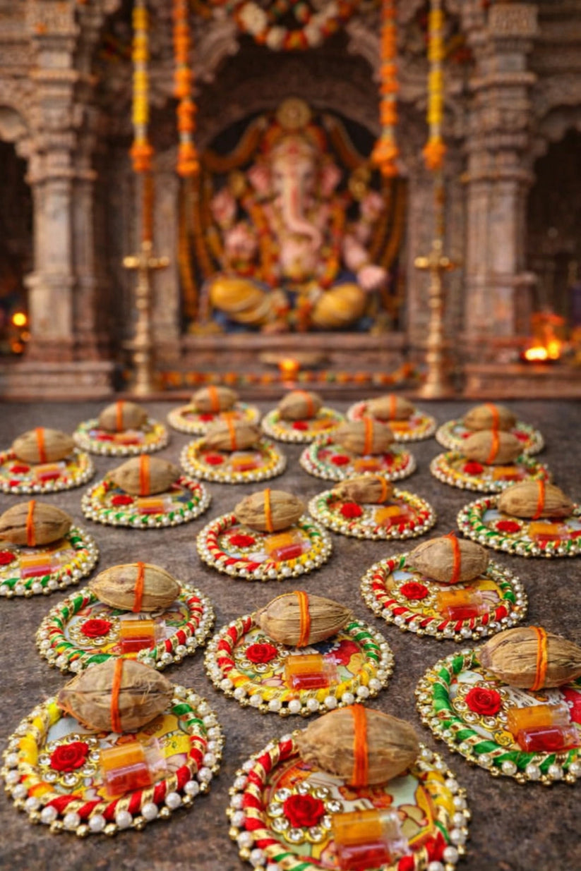 Traditional Pichwai MDF thali decorated with buta design and mini nariyal for wedding pooja rituals