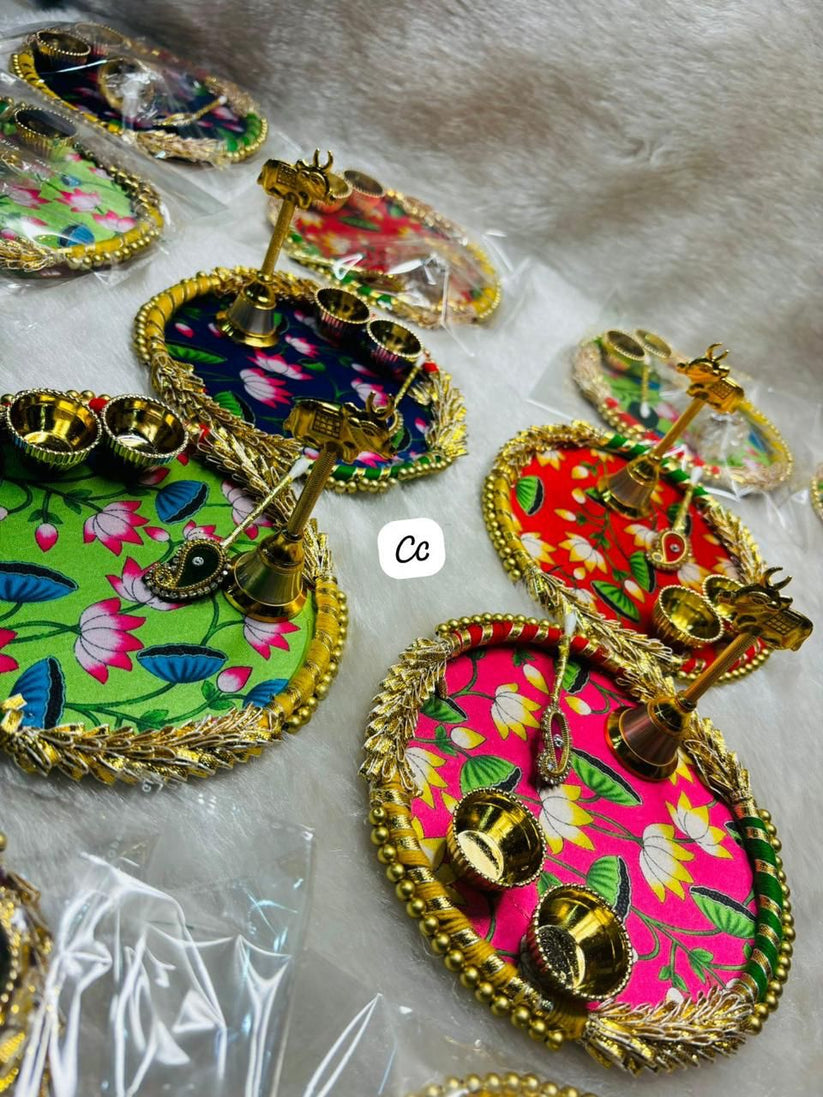 Pichwai design pooja thali with brass diya bell and kumkum holders for home mandir and festive puja