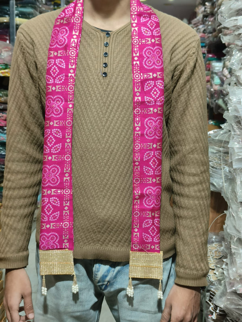 Pink Bandhej dupatta with golden zari border for festive wear