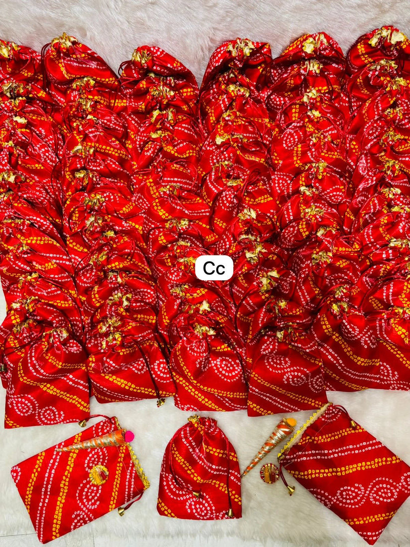 potli bag gift hamper with mehndi cone for wedding and mehndi ceremony