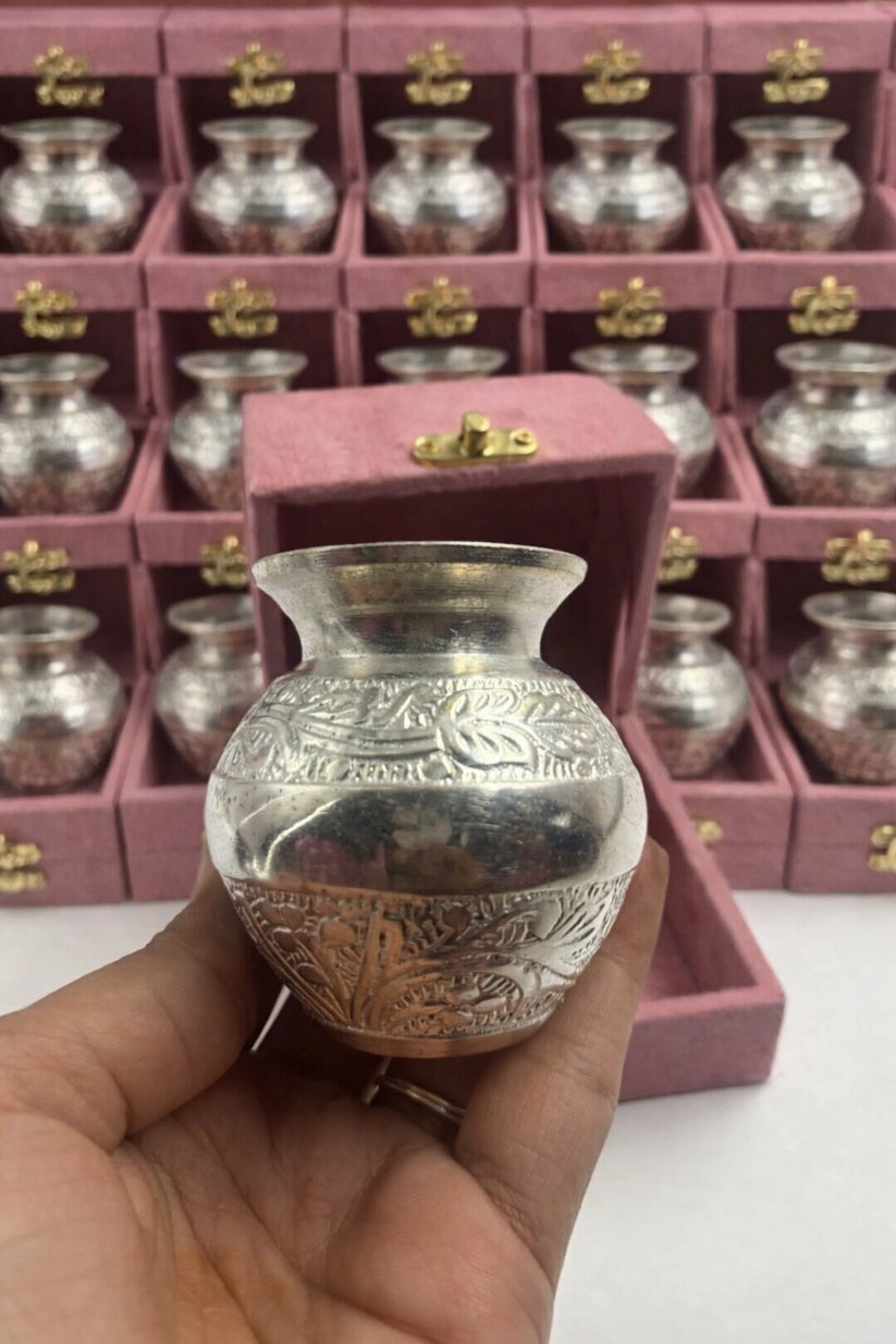 close view of silver kalash for pooja rituals and temple use