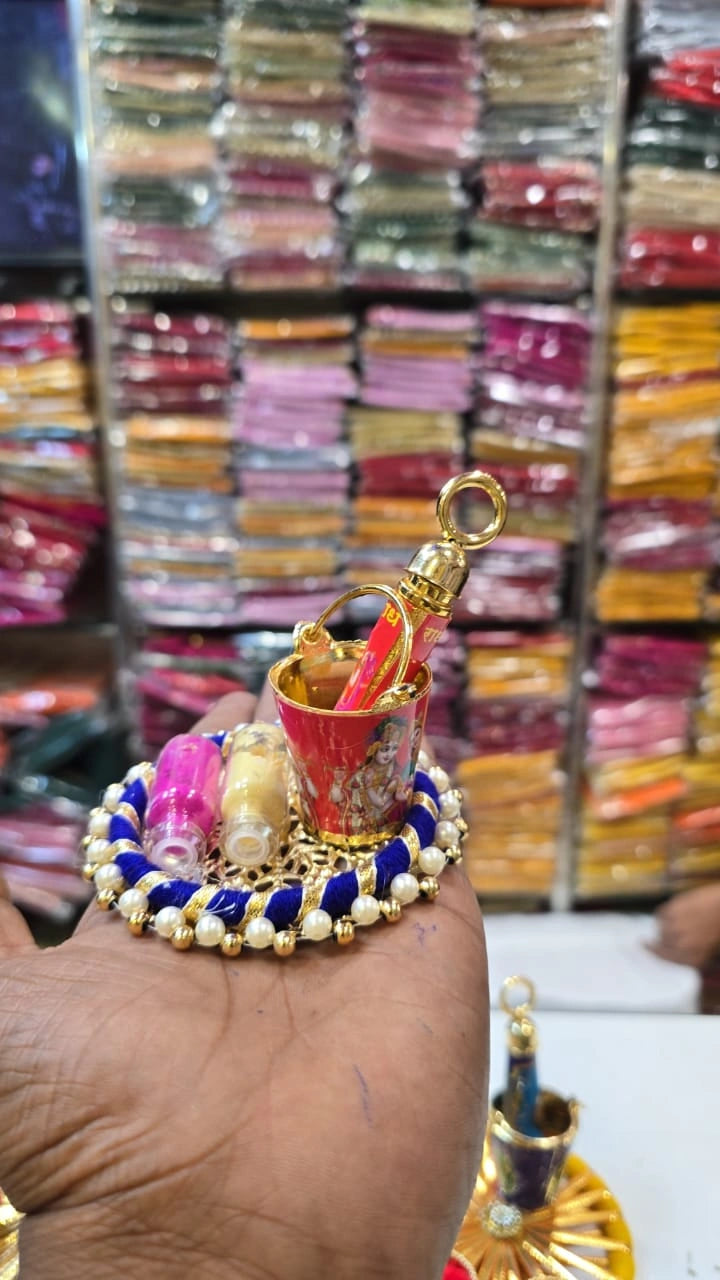 Radha Krishna themed Holi balti pichkari and colour set for gifting and celebration