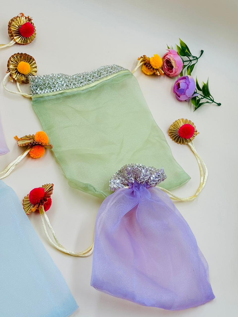 Simple organza potli bag for wedding return gifts and festive gifting